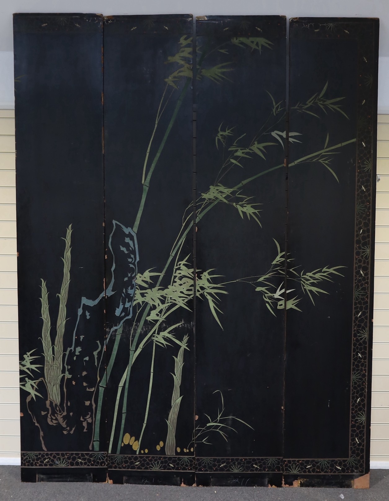 A tall Chinese coromandel lacquer twelve panel screen, 19th century, each leaf panel width 49cm, height 264cm